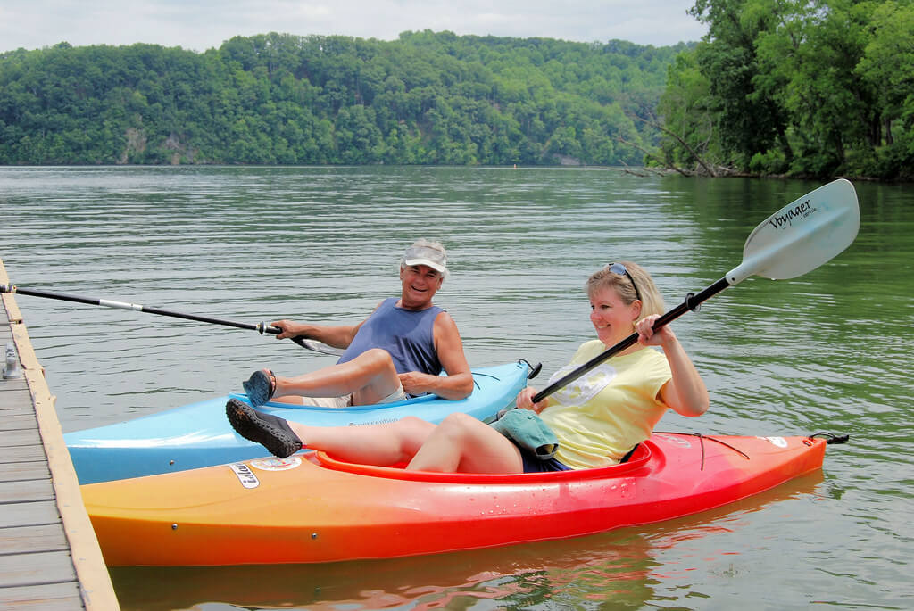 couple kayaking in a lake